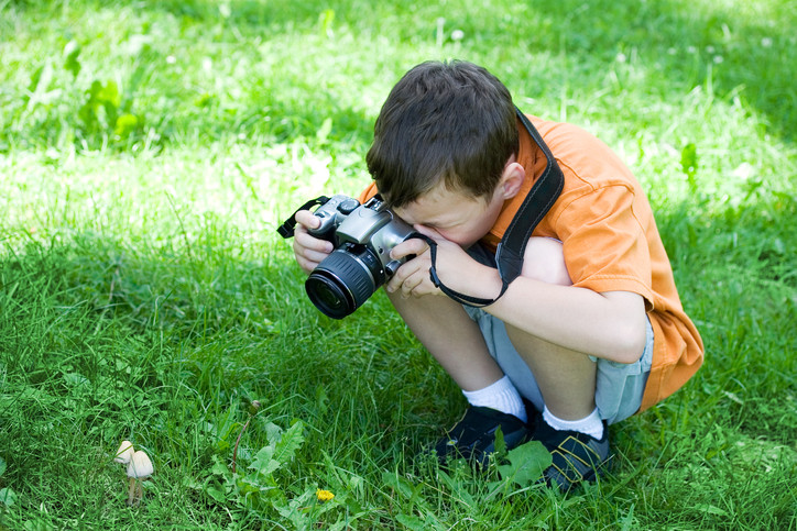 boy taking photo